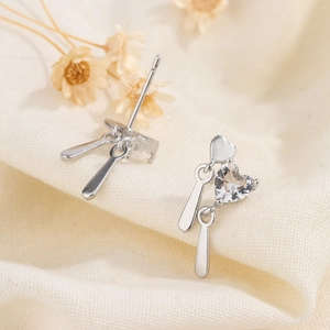 Minimalist s925 silver heart stud earrings with water drop pendants on linen fabric