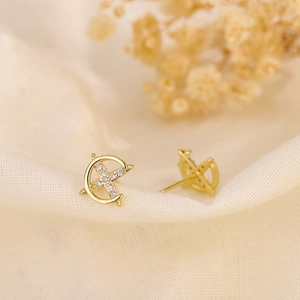 Elegant gold crescent moon and star stud earrings featuring sparkling white zircon accents