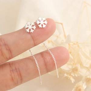 Elegant S925 sterling silver snowflake threader earrings with a polished finish