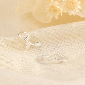 Polished S925 silver ear cuffs featuring a delicate three-leaf branch design for women