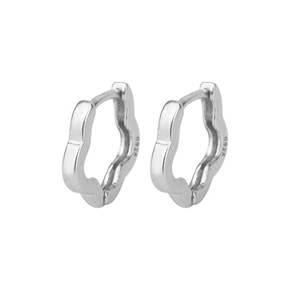 Detail showing S925 hallmark on polished silver flower petal hoop earrings