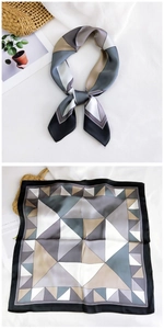 Detailed view of 70cm square silk scarf featuring modern geometric triangle pattern