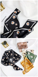 Collection of silk scarves featuring daisy patterns in black, beige, and green colors
