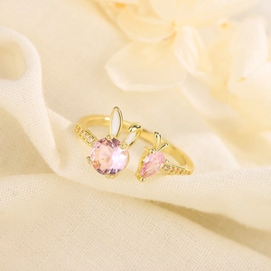 Pink rabbit and carrot open ring with sparkling zircons on a gold-plated adjustable band