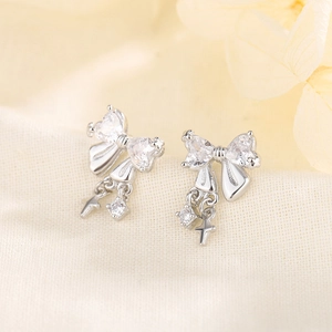 Elegant S925 silver bow earrings with sparkling zircon stones and cross pendants