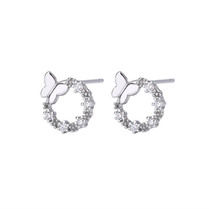Detail of S925 silver hoop earrings with butterfly design and pavé zircon stones
