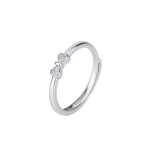 Polished S925 silver bow-knot ring with sparkling cubic zirconia in a minimalist style