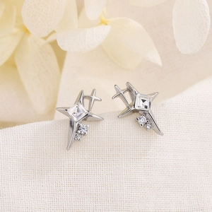 Elegant S925 silver star stud earrings with square cubic zirconia on a soft fabric