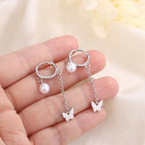 Boucles d'oreilles élégantes en argent S925 avec papillon, perles et pompons pour femmes