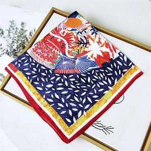 Silk square scarf with abstract botanical patterns and vibrant polka dots in artistic layflat