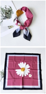 Flat lay and knotted display of a burgundy square silk scarf with large daisy patterns
