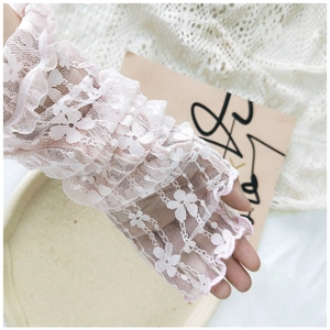 Close-up of floral lace arm sleeves in light pink with scalloped edges and breathable mesh
