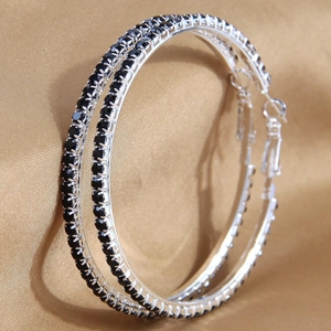 Chic 60mm silver-tone hoop earrings with pave-set black rhinestones on silk fabric