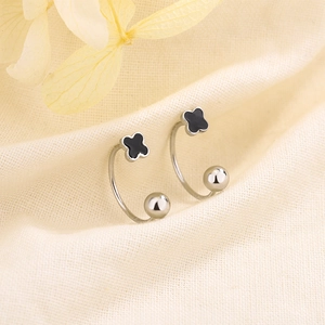 Minimalist silver clover screw-back earrings with black enamel detail for women