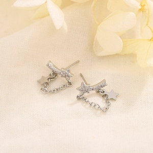 Sparkling star stud earrings in 925 silver with dangling stars and bright cubic zirconia