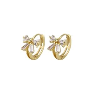 Boucles d'oreilles créoles dorées en forme de nœud avec pierres de zircone cubique