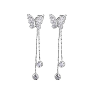 Macro detail of S925 silver butterfly tassel earrings with sparkling zircon inlay