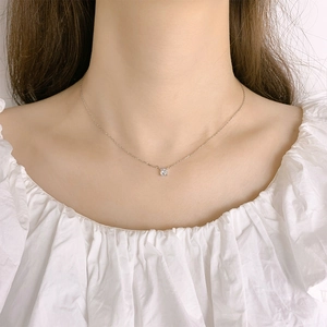 Elegant 925 sterling silver solitaire zircon necklace on model for minimalist look