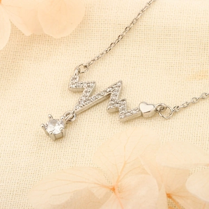 Collana battito cardiaco in argento da donna con pendente a cuore e pietra di zircone