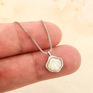 Elegant shell pendant necklace with white mother of pearl inlay on a silver box chain