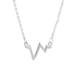 Detailed view of the silver minimalist heartbeat pendant necklace with polished finish