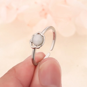 S925 silver open ring featuring a cat-eye stone in a delicate floral petal setting