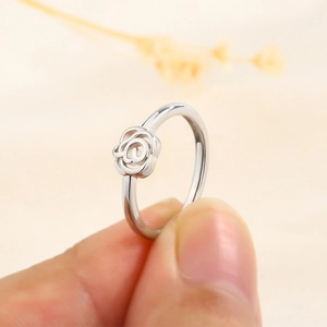 Elegant S925 silver hollow rose flower ring with a minimalist open-work floral design