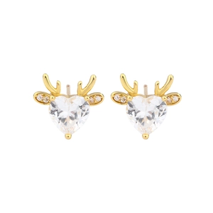Detailed macro view of heart-shaped zircon earrings with golden elk antlers and tiny diamonds