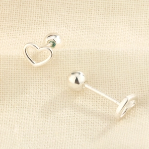 Macro shot of S925 silver hollow heart earrings with secure screw-on ball backings