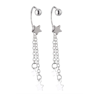 Detailed macro view of polished silver star tassel earrings with three hanging chains