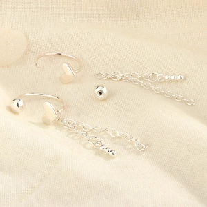 Silver heart screw earrings set with elegant long tassel pendants and polished finish
