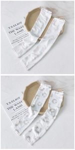 Detail of pink and grey ink dye ice silk sun protection sleeves with breathable fabric
