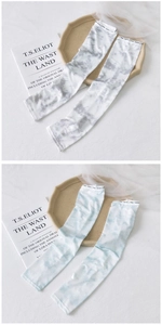 Detail of tie-dye cooling ice silk sun sleeves with elastic non-slip fashion cuffs