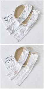Detail of ice silk sun sleeves with tie-dye marble pattern and fashion elastic cuffs