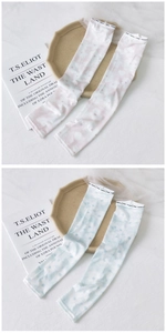 Detail of pink and blue cloud gradient sun sleeves with elastic Fashion bands