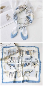 Detail of silk square scarf with equestrian horse print and blue hem in flat and tied view