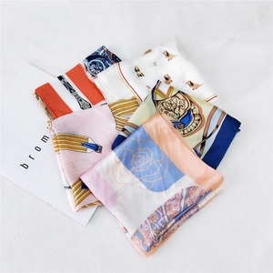 Selection of elegant patterned silk scarves with vintage floral and geometric designs