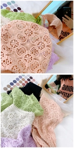 Detailed close-up of multi-color crochet lace scarves with intricate floral hollow patterns