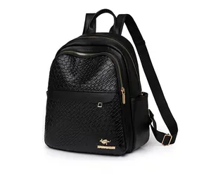 Detail of black crocodile texture backpack with metallic kangaroo logo and dual zippers