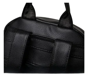 Macro detail of high-quality stitching and texture on black faux leather backpack handle