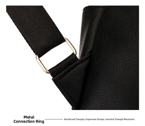 Detailed close-up of durable golden metal D-ring and reinforced leather stitching on bag
