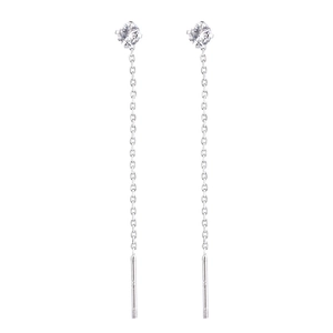 Detail of long silver chain earrings featuring a clear cubic zirconia stud and thin O-chain