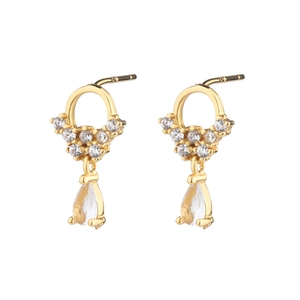 Macro shot of 18K gold water drop earrings featuring sparkling cubic zirconia stones