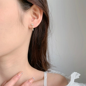Boucles d'oreilles pendantes dorées avec note de musique en zircone et goutte