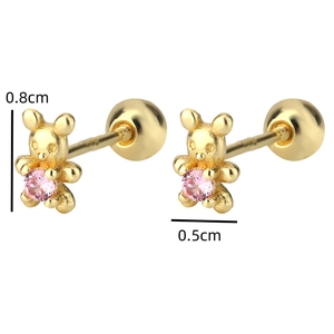 Detailed view of bear-shaped gold studs with pink stones and threaded backings