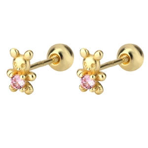 Macro detail of bear stud earrings with pink heart stone and screw-back closure