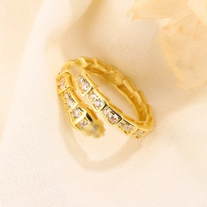 Luxurious gold snake ring with sparkling zircon stones and textured spiral design