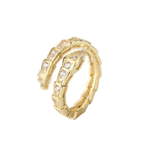Luxurious gold snake-shaped spiral ring with micro-paved diamonds and scale texture