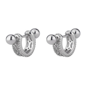 Detailed view of silver U-shaped curved barbell stud earrings with hollow textured beads