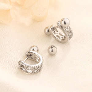 S925 silver screw back earrings featuring hollow patterns and fine micro-dot edge details
